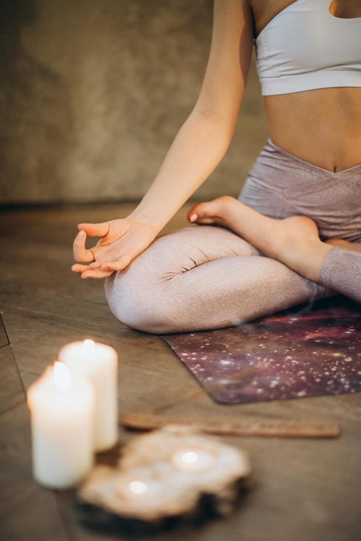 A still seated meditation with candles — the contemplative space these books invite